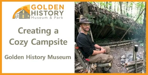 Creating a Cozy Campsite Golden History Museum - man sitting by fire with leanto shelter