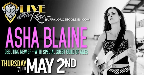 Woman holding guitar - Asha Blaine at the Buffalo Rose