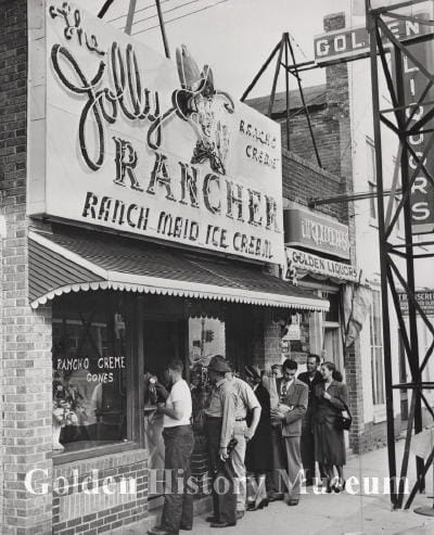 black and white photo of the Jolly Rancher ice cream store in downtown Golden on opening day in 1949