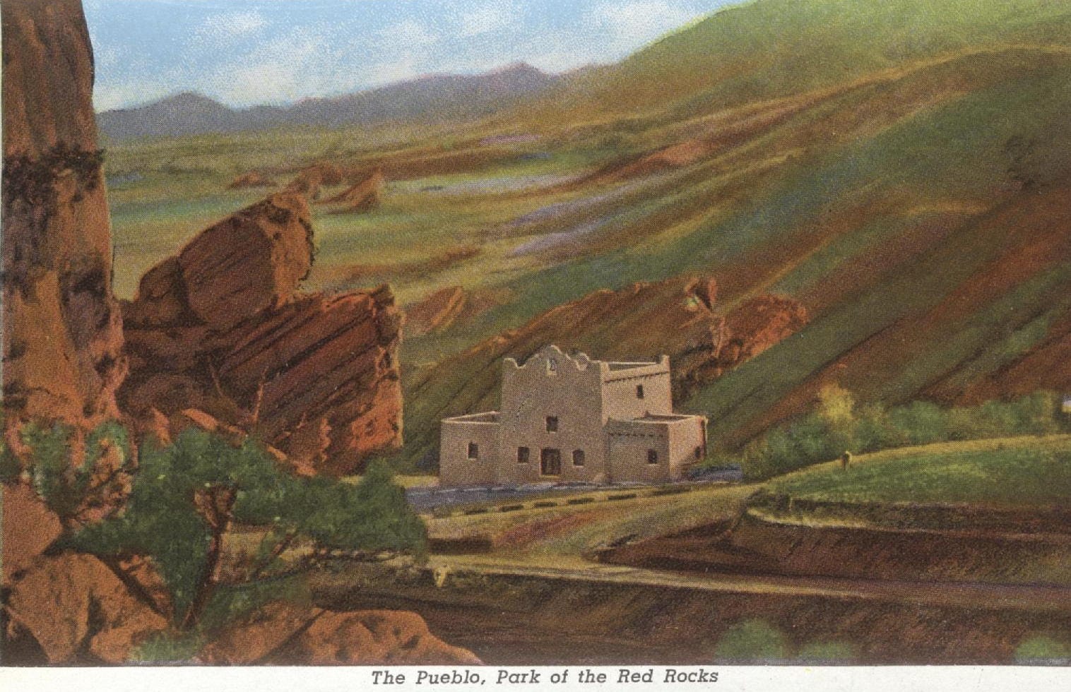 Hand-tinted postcard showing mission-style building in Red Rocks park