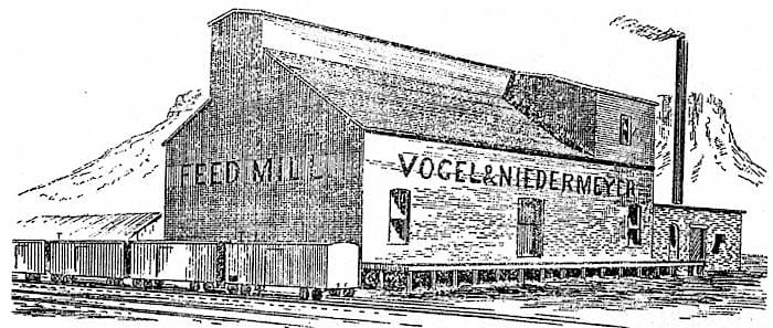 pen and ink drawing of building saying FEED MILL with freight cars parked nearby and a loading dock