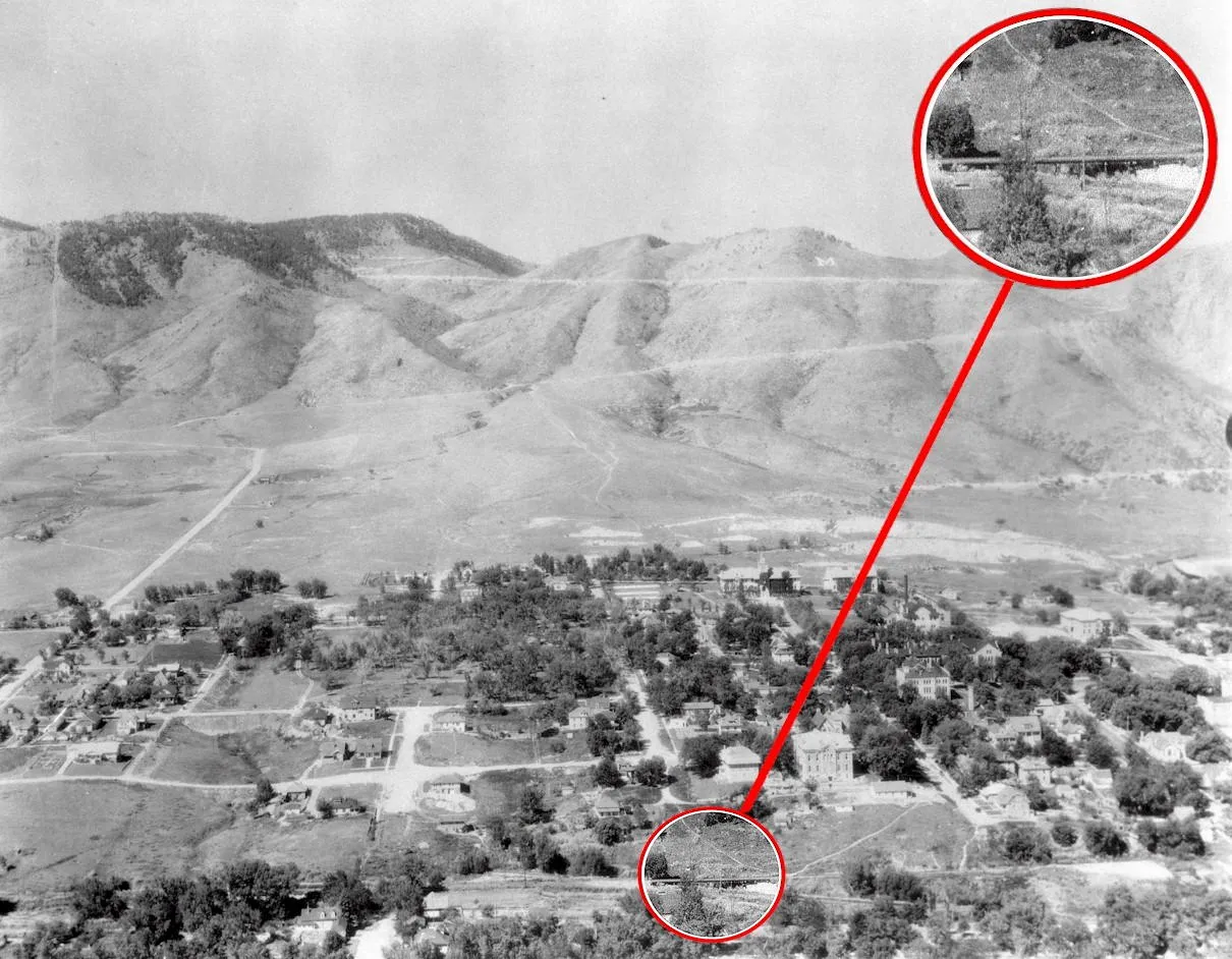 Black and white photo showing early 20th century Golden.  A bridge going over Kinney Run is circled.