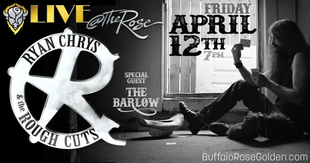 man with long hair & beard tossing cards into a cowboy hat