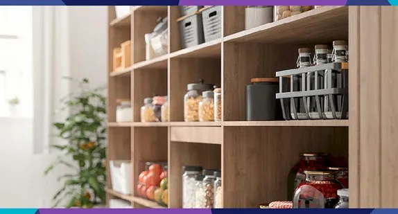 Jars and baskets used to contain food and other items on a set of wooden shelves