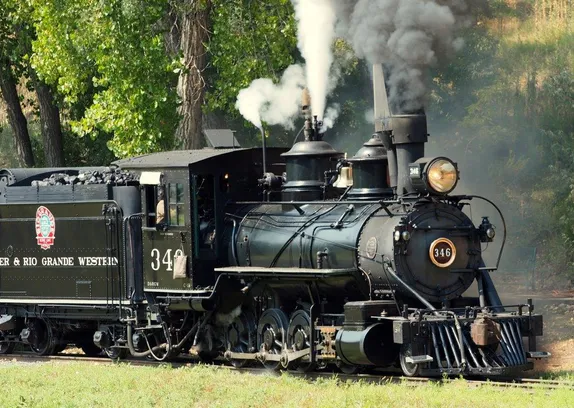 antique steam locomotive #346 and coal tender