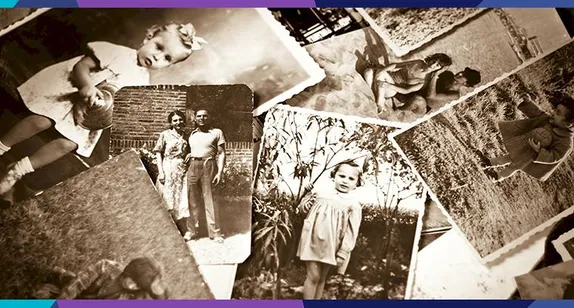 old photos of people spread over a surface