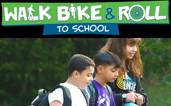 2 boys and a girl with backpacks